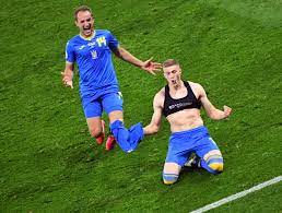 Fans baffled as Ukraine hero Dovbyk takes off shirt to reveal £200 sports  bra after last-gasp winner against Sweden