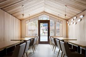 A small diner with an even smaller mustang. Urban Cabin Small Space Conscious Restaurant With Cozy Modern Ambiance