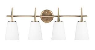 Table lamps enhance the mood in any room. Mixing Finishes Delta Champange Bronze
