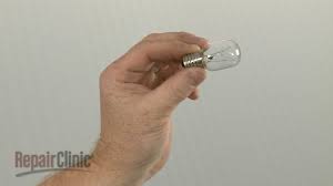 whirlpool microwave replace light bulb