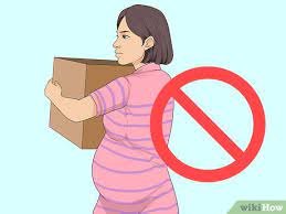 how to lift objects when pregnant with