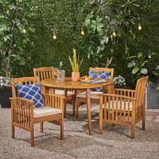 Casa Acacia Patio Dining Set 4 Seater 47 Round Table With Straight Legs Teak Finish Cream Outdoor Cushions