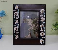 brown solid wood table photo frame