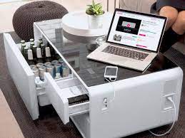 Looks just like any other modern coffee table. This Coffee Table Lets You Refrigerate Food And Charge Your Phone