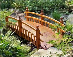 half picket rail wooden garden bridge