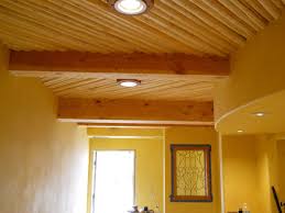 hand crafted beam and latilla ceiling