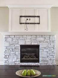 a white washed stone fireplace tutorial