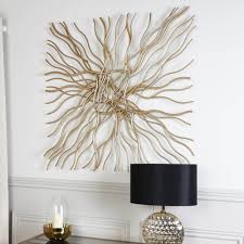 This wall art set features three beautifully sculpted leaves created from molten iron and finished in golden hues. 100x100 Gold Metal Wall Art Golden Wall Art Wave Wall Art