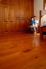 can i install a solid wood floor in a