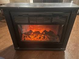 Heat Surge Movable Electric Fireplace