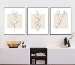 set of three botanical prints in beige