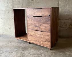 You can get a custom looking bar at a great price. Dry Bar Cabinet Etsy