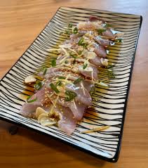 kingfish sashimi with ginger and hot