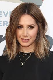 2014 layered cut ashley tisdale shows off her fine mane when she attends a premiere. Ashley Tisdale S Hairstyles Hair Colors Steal Her Style