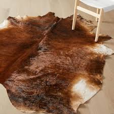 rawhide beige brown cow area rug