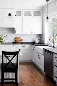 40 white cabinets with black hardware