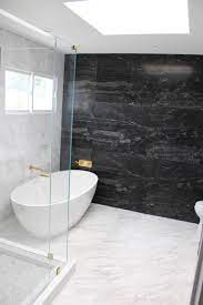 75 gray tile and marble tile bathroom