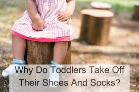 toddlers take off their shoes and socks