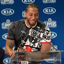 He actually doesn't look too bad with that kind of hair, makes him look older. Kawhi Leonard Says Magic Johnson Leaking Details Of Free Agency Meeting Didn T Stop Him From Joining Lakers Silver Screen And Roll