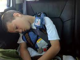 While Sleeping In Their Car Booster Seat