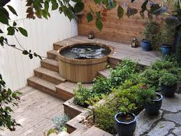 Outdoor Soaking With A Classic Wood Hot Tub