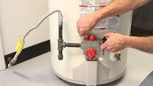 How to reset gas water tank pilot light - YouTube