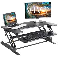Advocates of standing desks point to studies showing that after a meal, blood sugar levels return to normal faster on days a person spends more time standing. Vivo Height Adjustable Standing Desk Monitor Riser Gas Spring Black Tabletop Sit To Stand Workstation Desk V000b Walmart Com Walmart Com