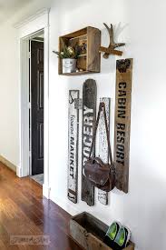 Compact Old Signs And Crate Coat Hook Area