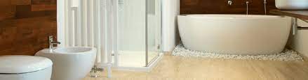 install a shower tray on a wooden floor