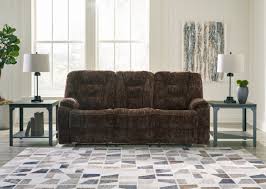 soundwave chocolate reclining sofa with