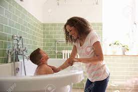 Mother And Son Having Fun At Bath Time Together Stock Photo, Picture and  Royalty Free Image. Image 71213956.
