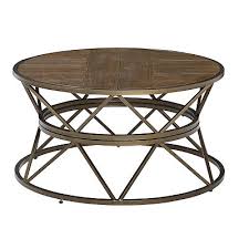 A rattan table that features a glass layer at the top. Round Kona Rolling Coffee Table From Kirkland S Home Accuweather Shop