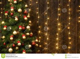 Abstract Wooden Background With Christmas Tree And Lights