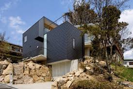 Steep Slope House With Bookshelf Lined