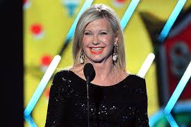 1 and ten other top ten. Olivia Newton John Dispels Rumors That She S Close To Death