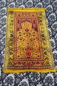 masjid yellow prayer rug