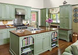 There is a difference between retro kitchen styles and vintage vintage kitchen cabinets can help make a unique and creative room that shows off the homeowner's interests and style. Add A Touch Of Vintage Charm To Your Kitchen With Painted Cabinets Decoist Green Kitchen Cabinets Kitchen Renovation Painting Kitchen Cabinets