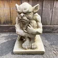 stone grumpy gargoyle statue outdoor