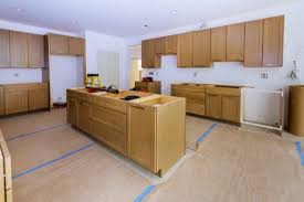 install floors or cabinets first