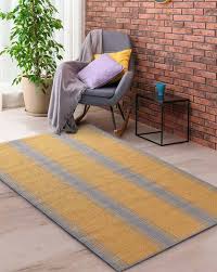 gold rugs carpets dhurries for