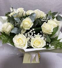 beautiful white roses hand tied bouquet