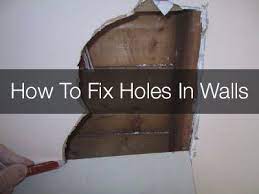 how to fix holes in plaster walls