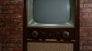 tilt up reveal old 1950s era tv stock