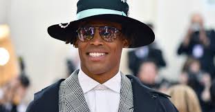 Cam newton's head scarf was mocked relentlessly on twitter. Cam Newton Outfits The Nfl S Mvp Of Crazy Postgame Fashion Fanbuzz