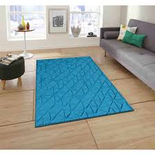 blue tufted area carpet