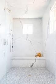 In this bathroom, white coats every surface, except the wood vanity, to maximize the bright, expansive effect. 74 Luxurious Marble Bathroom Designs Digsdigs