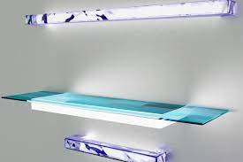 A Glass Shelf With A Blue Glass Shelf