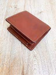 brown leather luxury wallet put