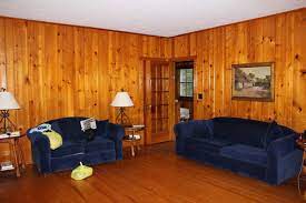 brighten a wood panel living room