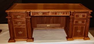 The desk was crafted from the english oak timbers of the british exploration ship called resolute, so that's where its name came from. Hand Carved Presidential Desk Solid Wood Tables